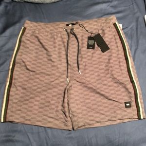 Kith Tilden swim trunks, shorts.
